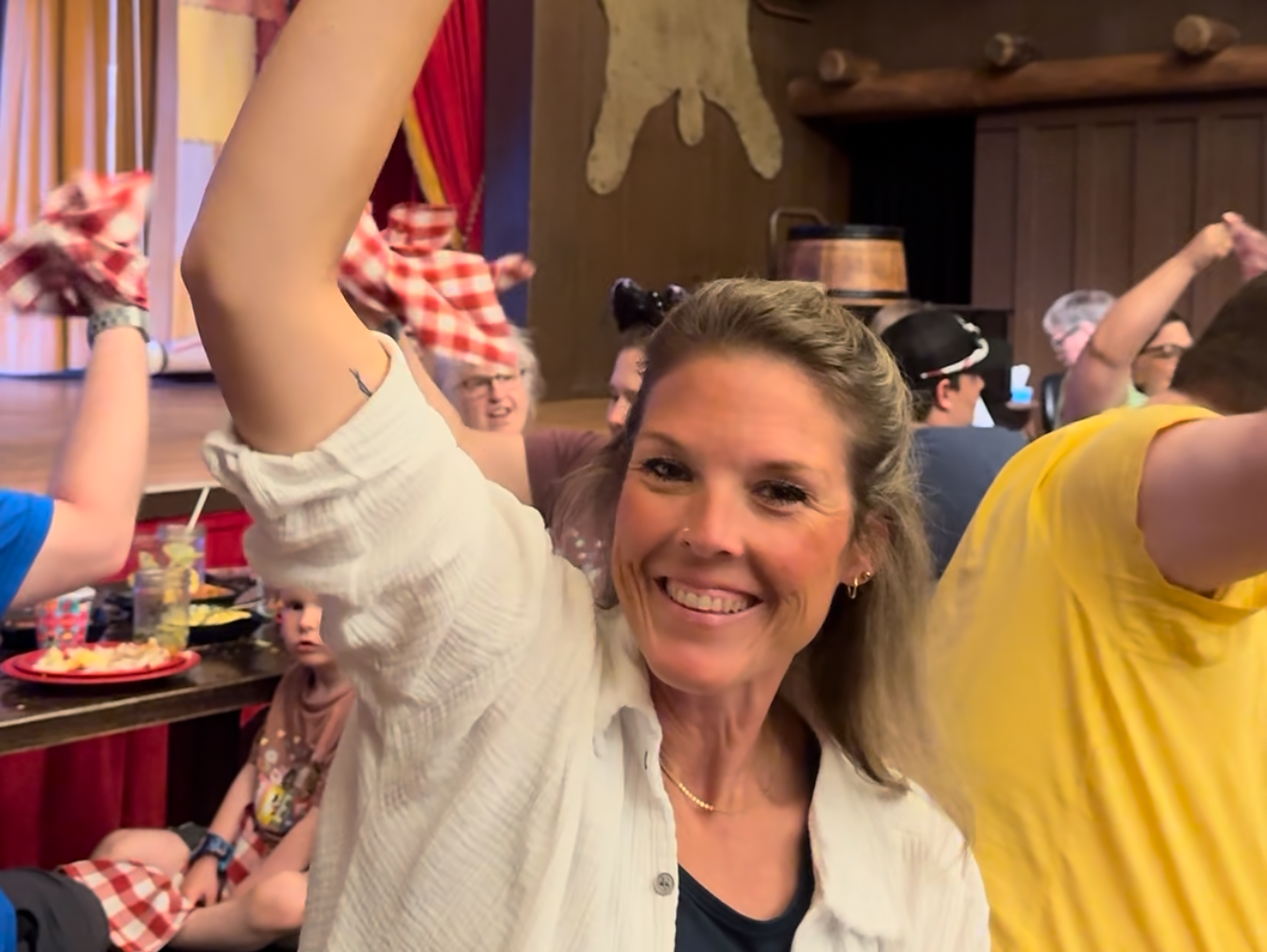 Rachel swinging napkins during the Hoop-Dee-Doo Musical Revue