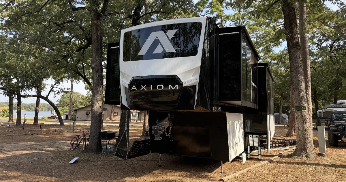 Axiom Vendetta 4250 parked in the woods, WanderLawings full-time RV